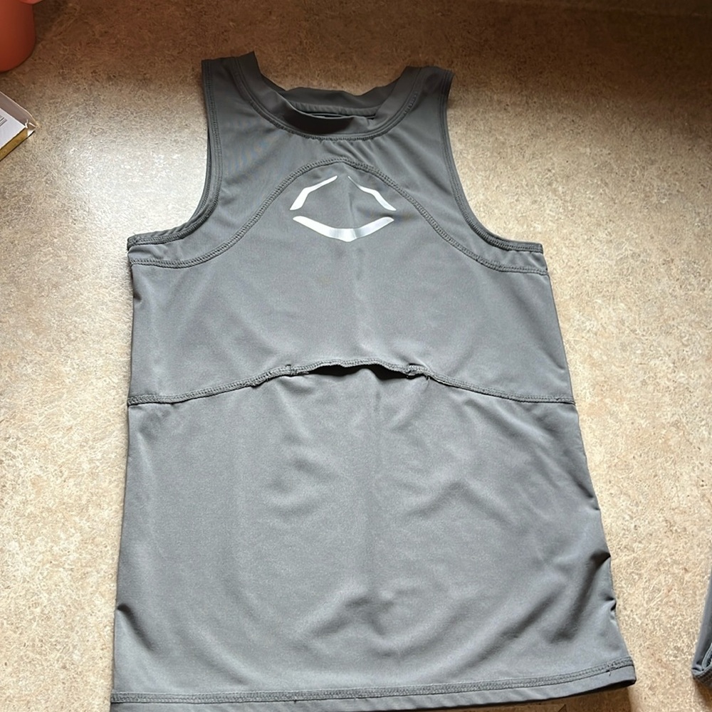 Youth M EvoShield Tank fits chest protection—not included